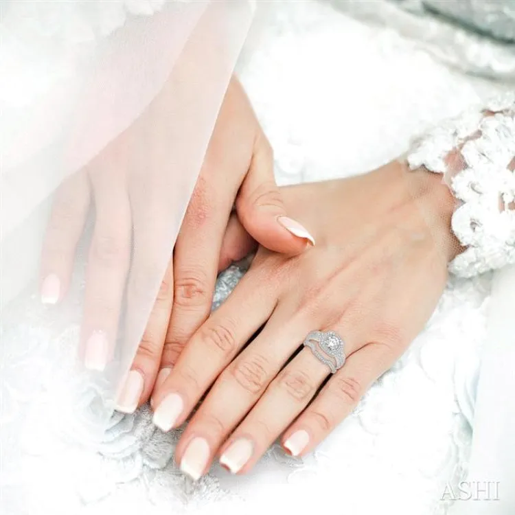 1 1/10 Ctw Diamond Bridal Set with 1 Ctw Round Cut Engagement Ring and 1/10 Ctw Wedding Band in 14K White Gold
