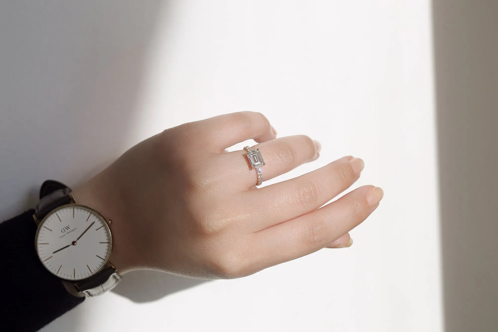 East-West Style Emerald Moissanite Engagement Ring