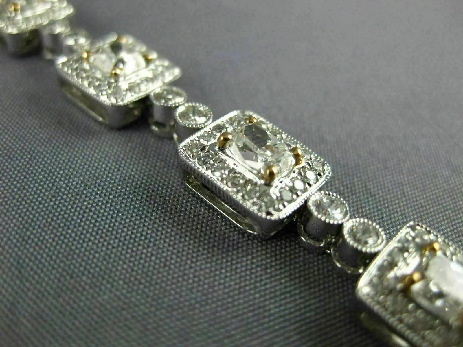 ESTATE WIDE 6.36CT WHITE & PINK DIAMOND 18KT WHITE GOLD FILIGREE TENNIS BRACELET