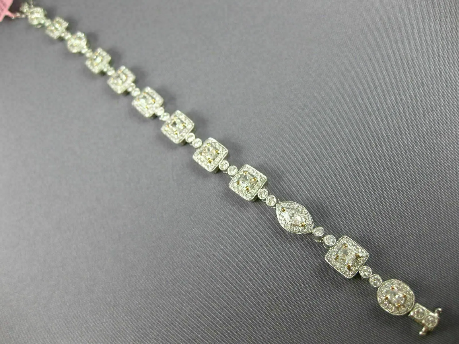 ESTATE WIDE 6.36CT WHITE & PINK DIAMOND 18KT WHITE GOLD FILIGREE TENNIS BRACELET