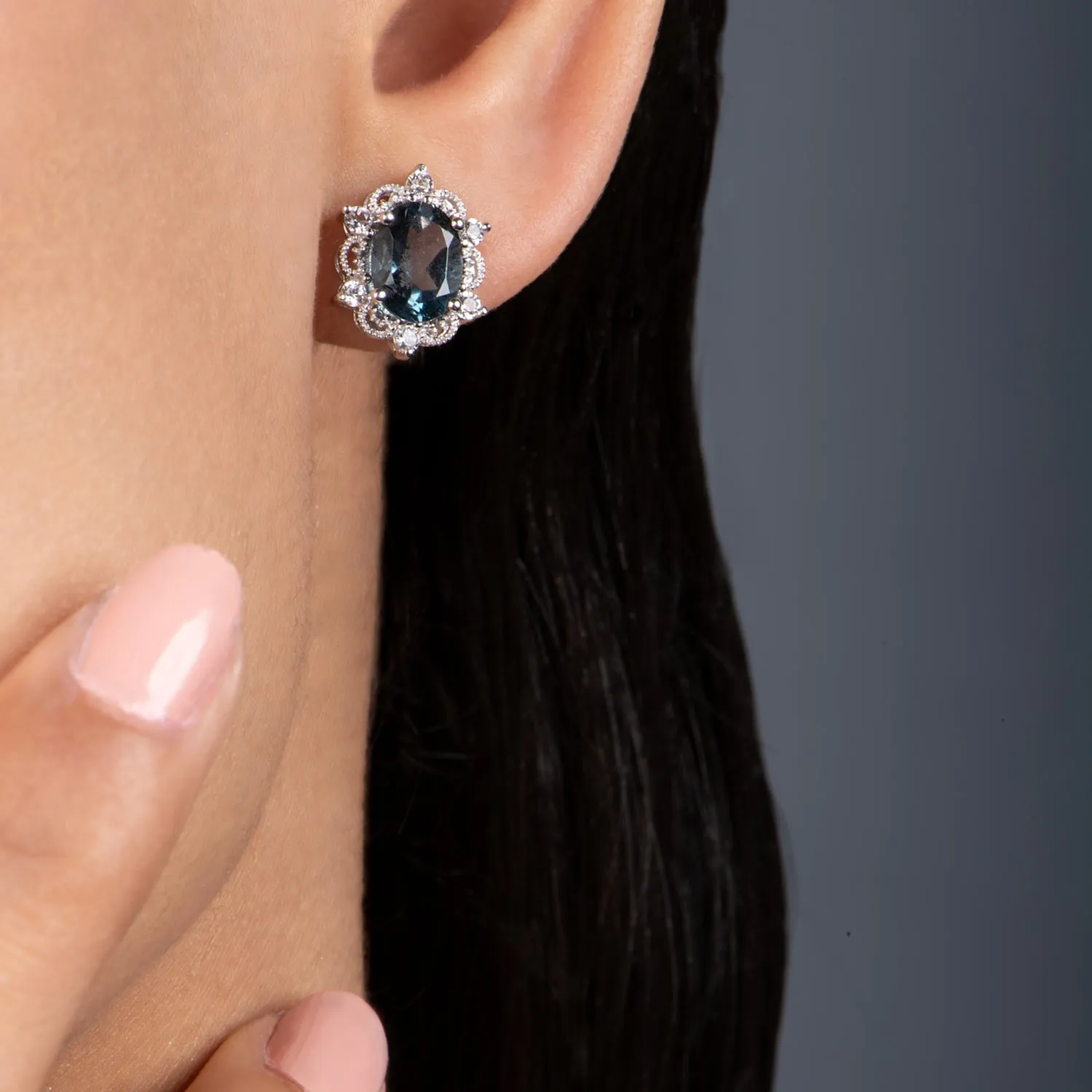 Jewelili Sterling Silver With London Blue Topaz and White Topaz Stud Earrings